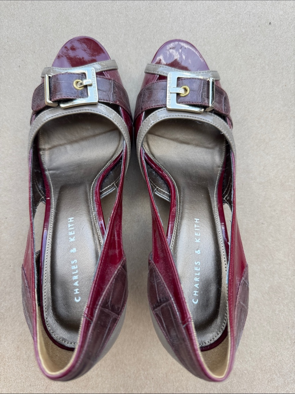 Charles & Keith Burgundy Patent Leather Buckle Heels with Gold Accent